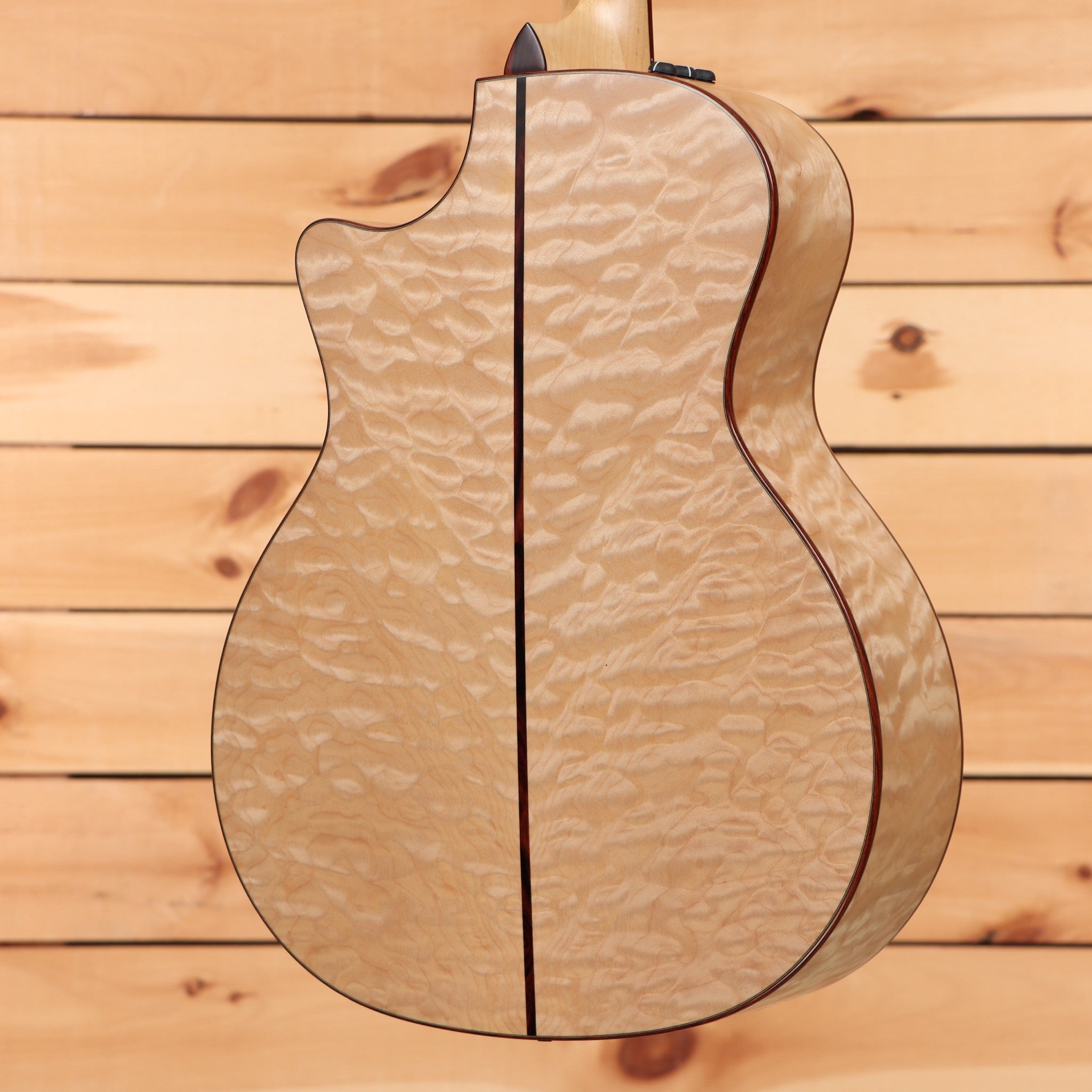 Pre-owned Taylor Custom TF natural acoustic guitar with textured wood grain back