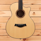 Taylor Custom TF natural acoustic guitar pre-owned with venetian cutaway and black bridge pins