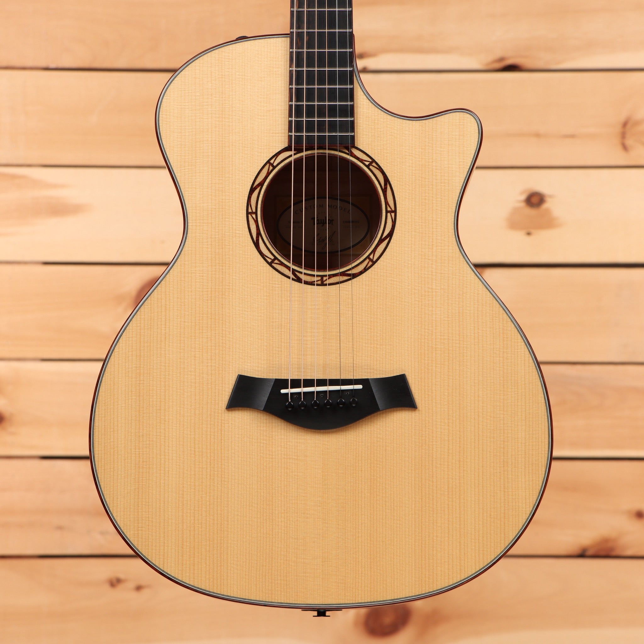 Taylor Custom TF natural acoustic guitar pre-owned with venetian cutaway and black bridge pins