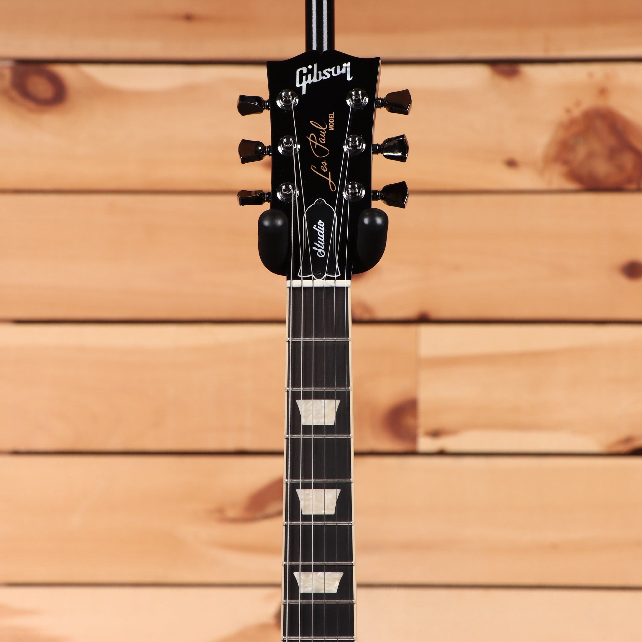 Gibson Les Paul Studio Session Translucent Ebony Burst electric guitar with dual humbuckers and rosewood fretboard