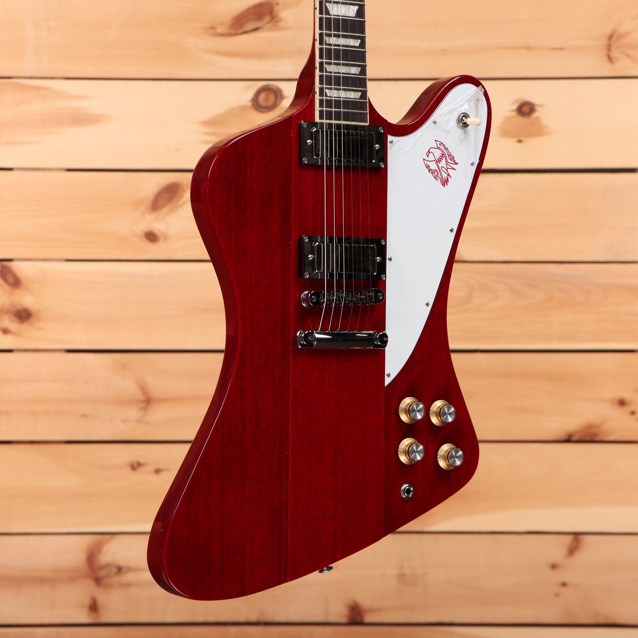 Gibson Firebird Platypus vintage cherry electric guitar with white pickguard and dual humbuckers