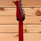 Gibson Firebird vintage cherry electric guitar with chrome tuning machines and black rear horn details