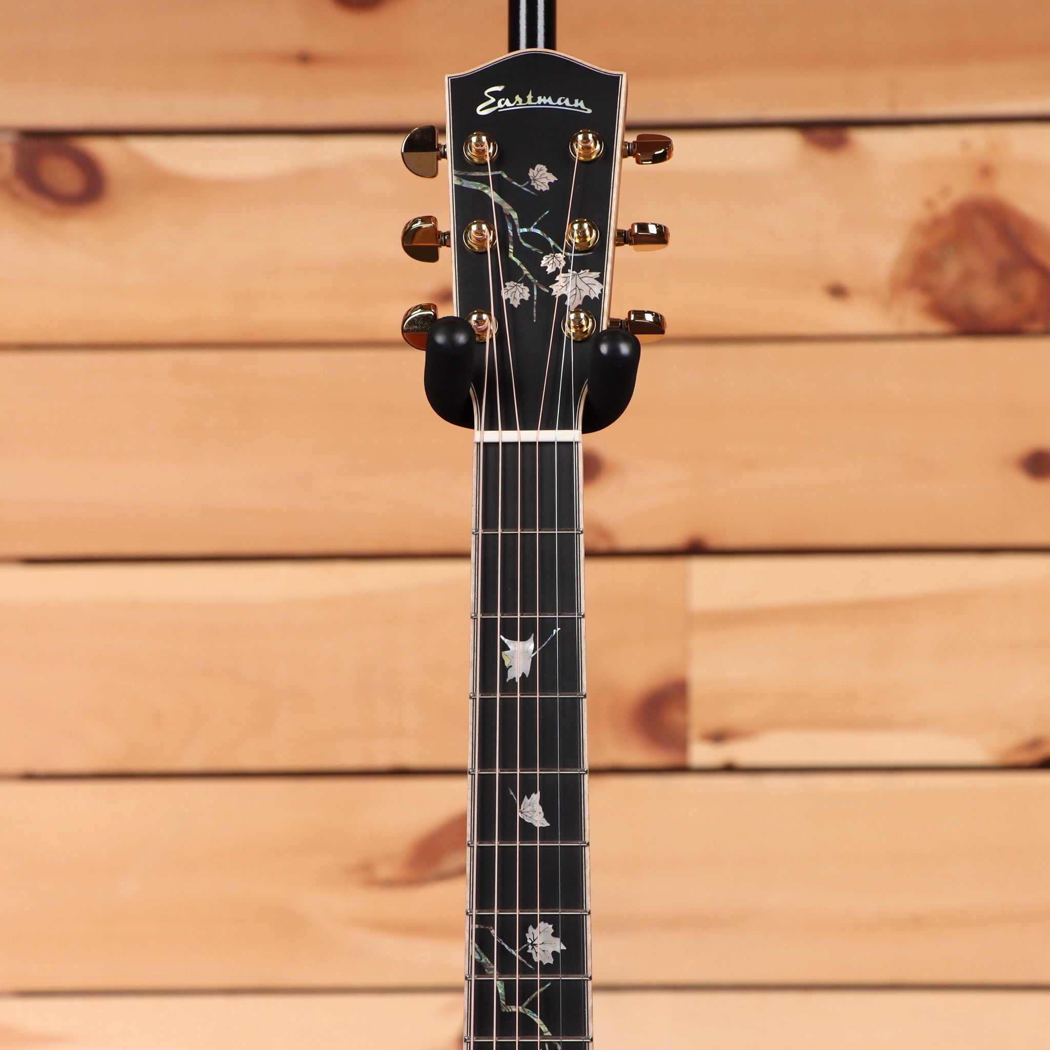 Eastman AC622CE sunburst acoustic guitar with abalone leaf inlays and gold tuning machines