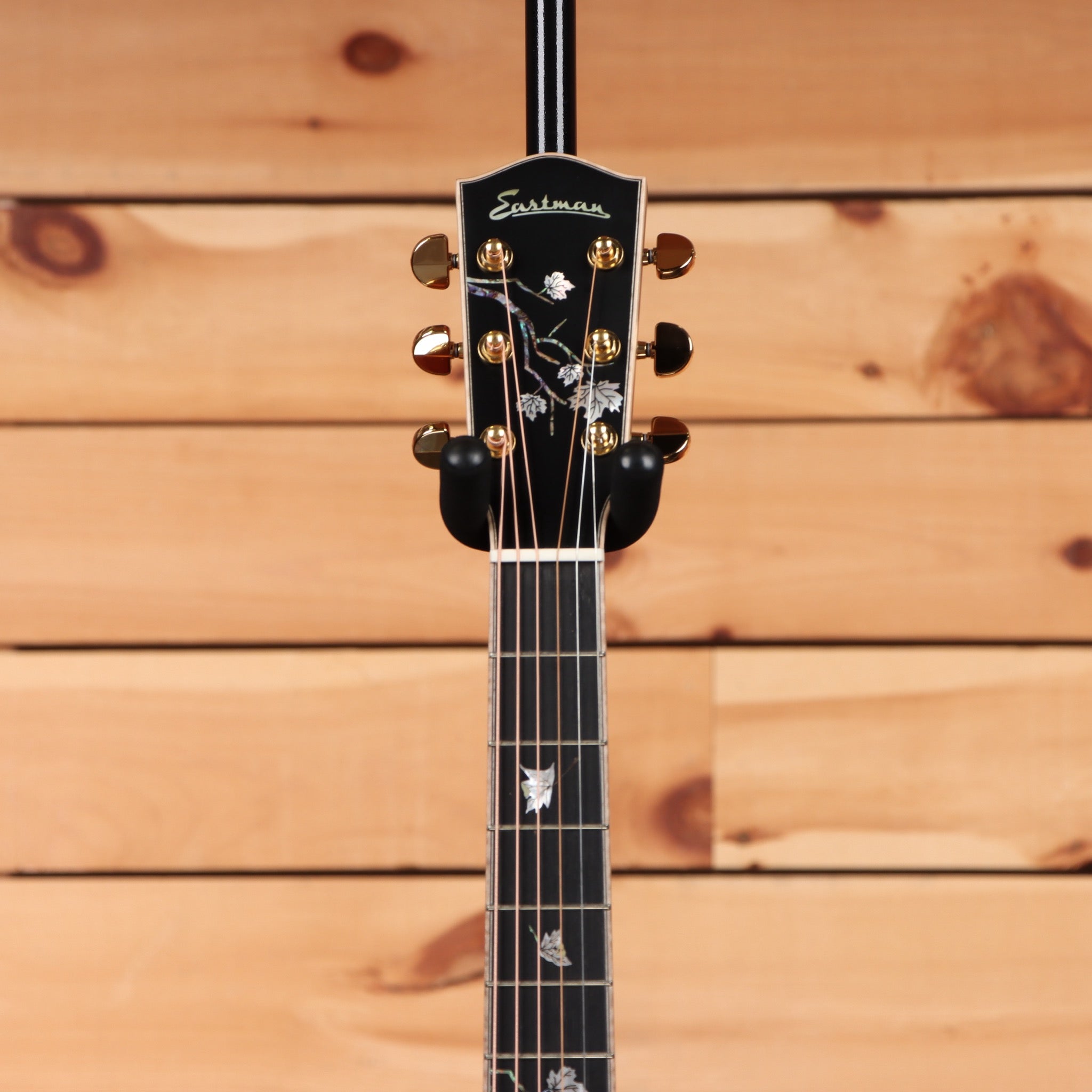 Eastman AC622CE sunburst acoustic guitar with abalone inlay and gold tuning machines