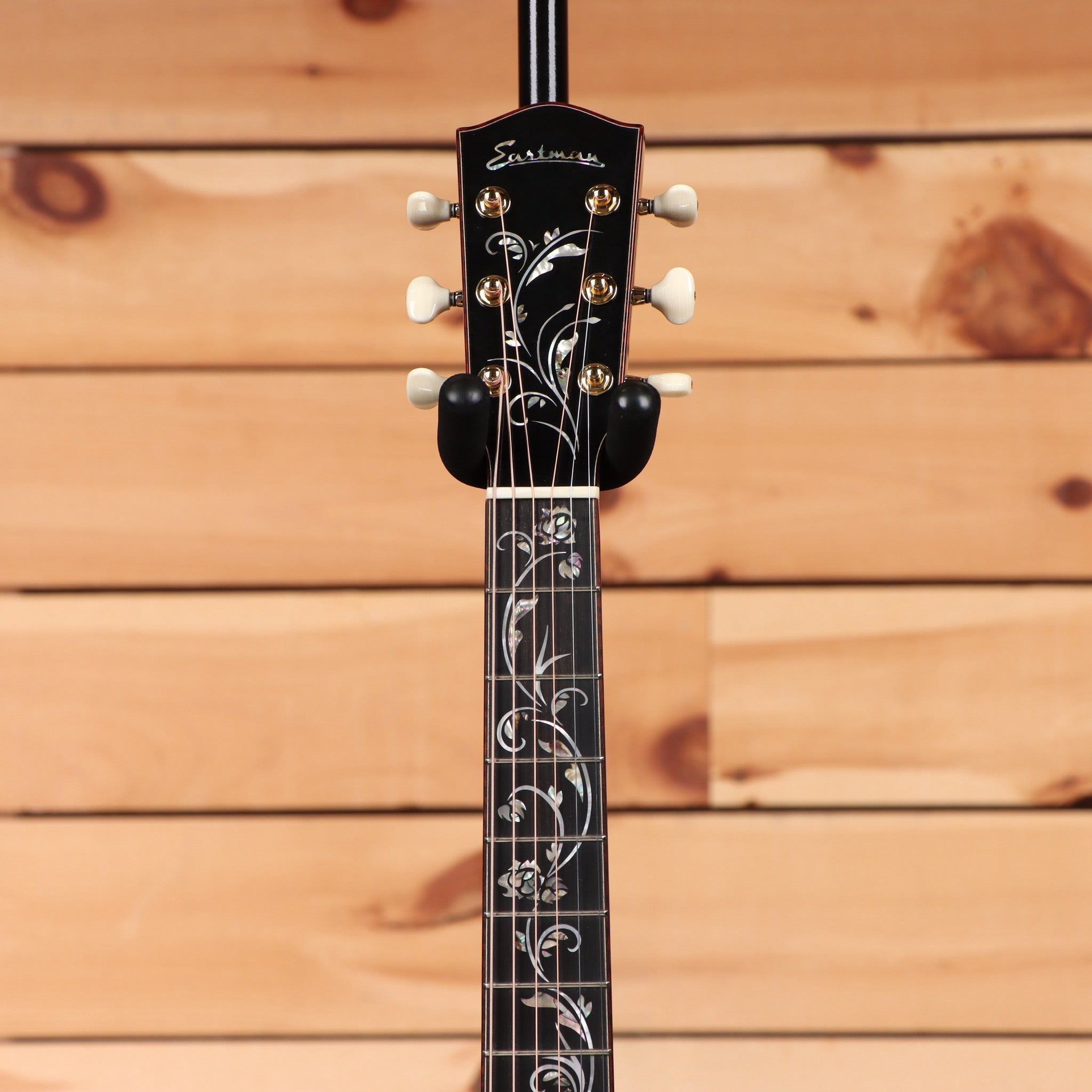Eastman AC922CE natural acoustic guitar with inlaid floral fretboard and white button tuners