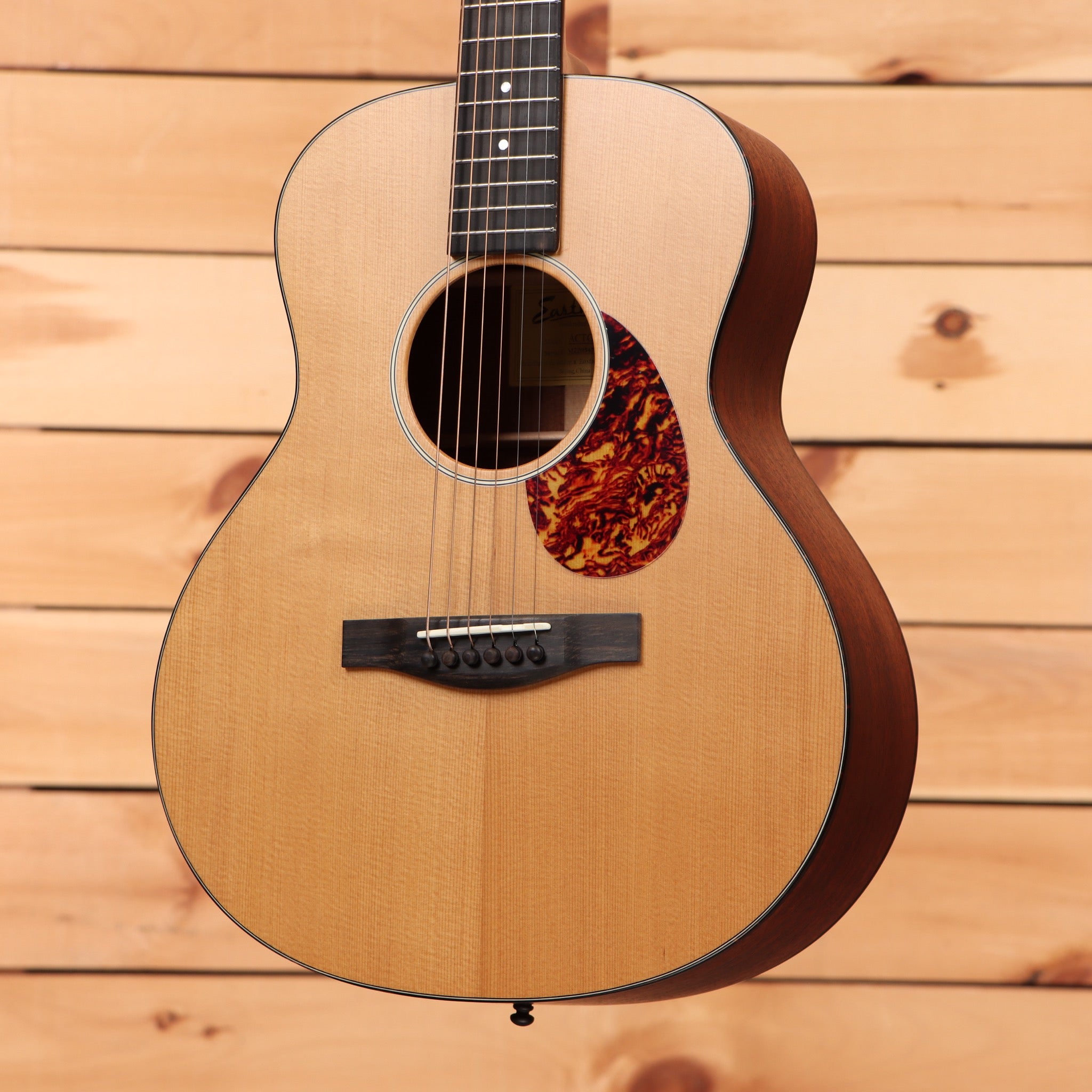 Eastman AC1G acoustic guitar natural finish with tortoiseshell pickguard and mahogany back