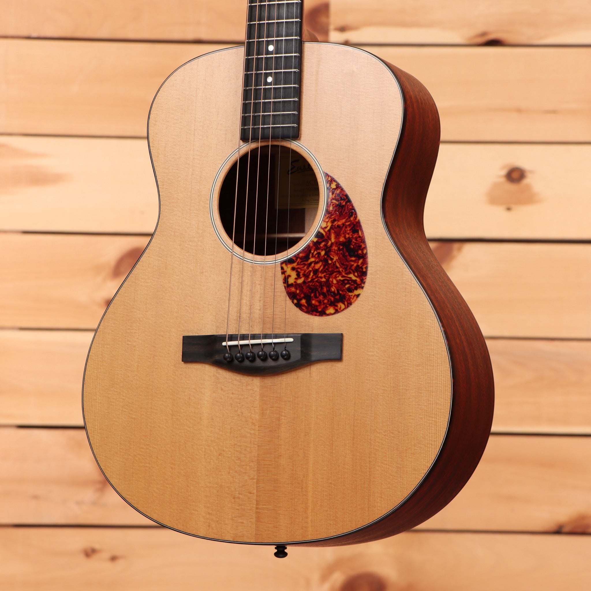 Eastman ACT G1 natural acoustic guitar with tortoiseshell pickguard and mahogany back sides