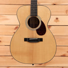 Eastman E10OMTC acoustic guitar natural finish with black pickguard and rosewood fretboard