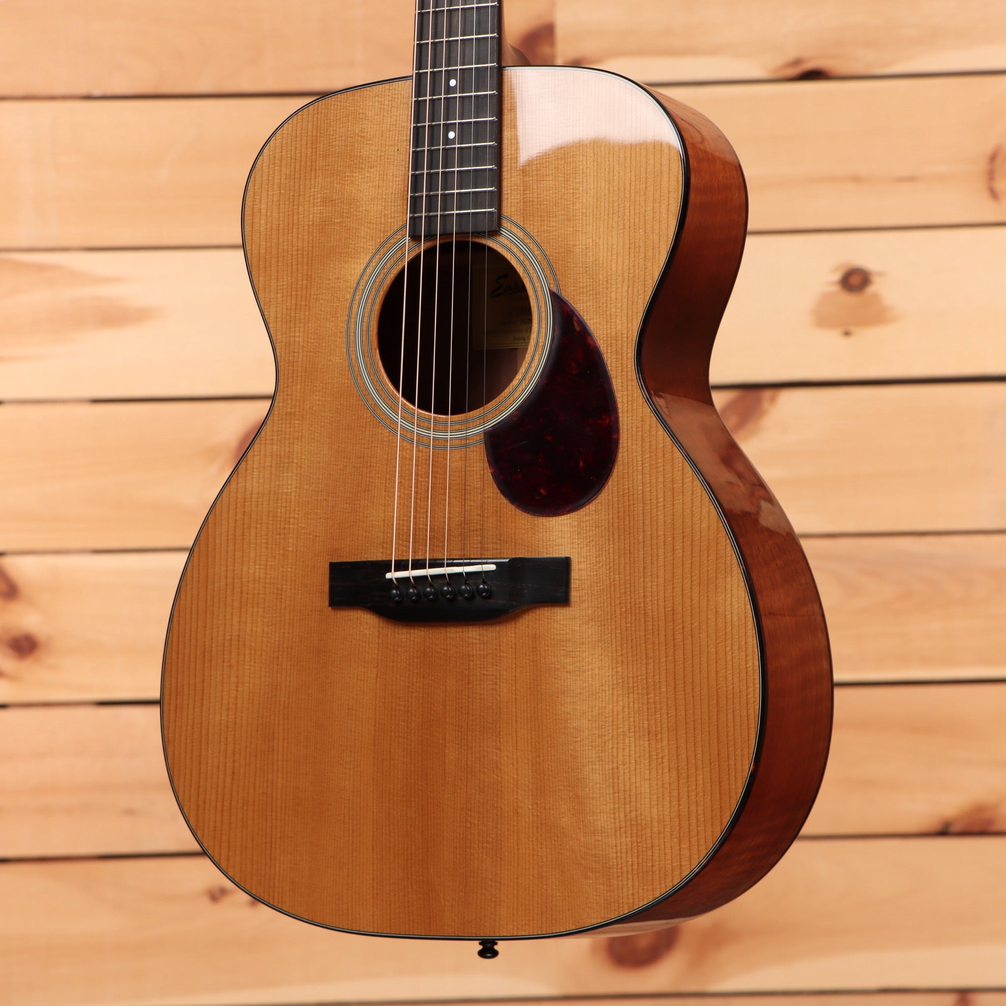 Eastman E10OM-TC dreadnought acoustic guitar natural finish with dark mahogany back and sides