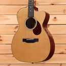 Eastman E1OMCEDLX natural acoustic guitar with venetian cutaway and tortoiseshell pickguard