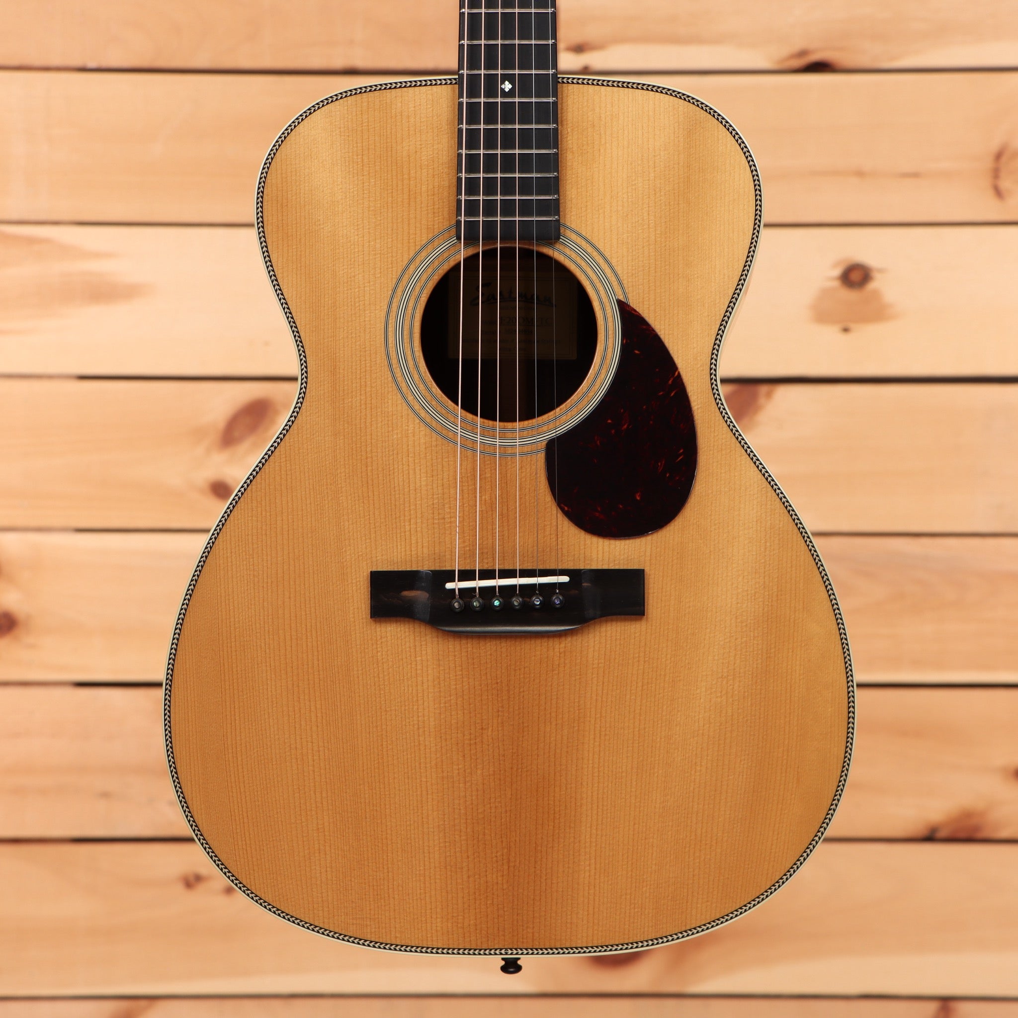 Eastman E20OM-TC acoustic guitar natural finish with tortoiseshell pickguard