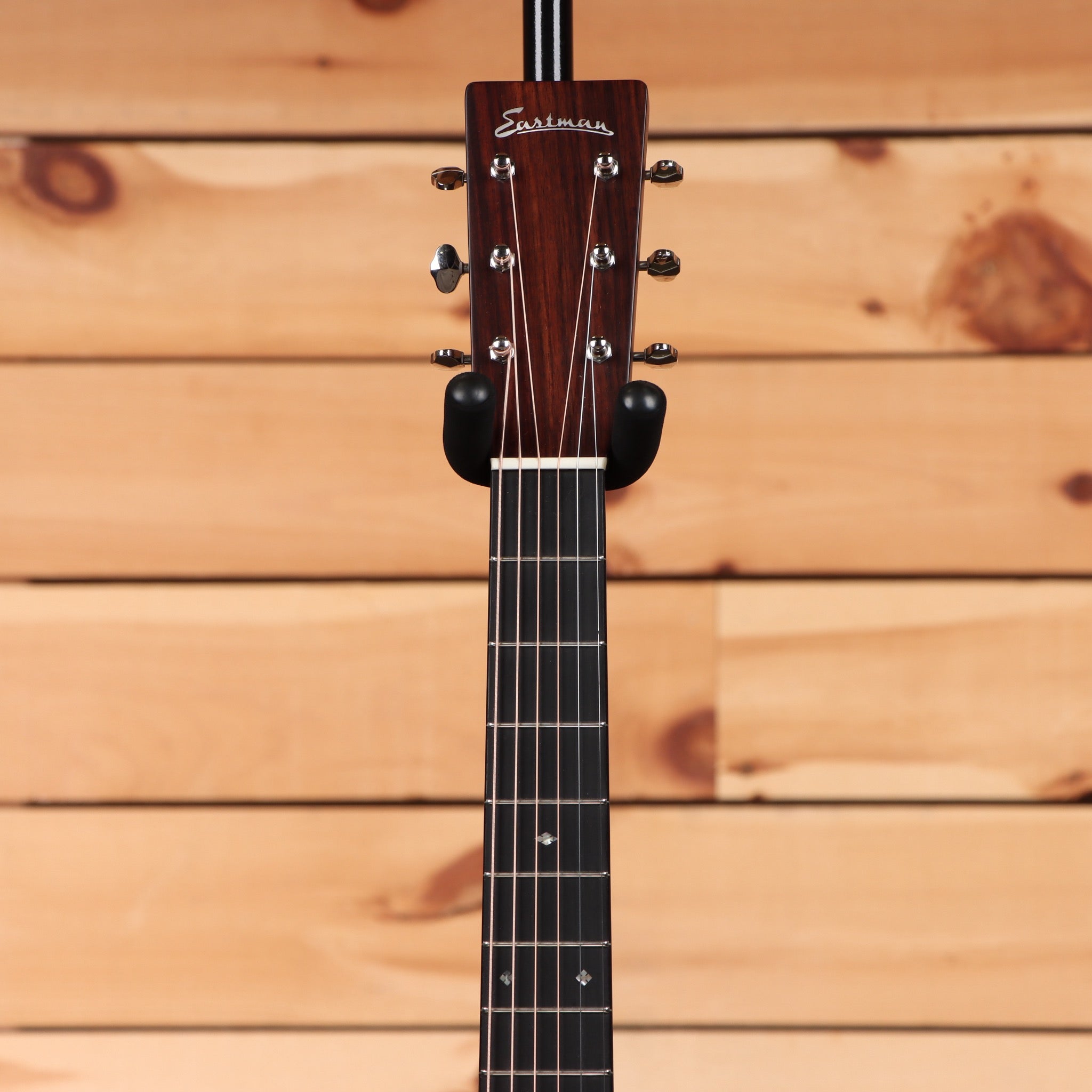 Eastman E20OM-TC natural acoustic guitar with rosewood fretboard and slotted headstock