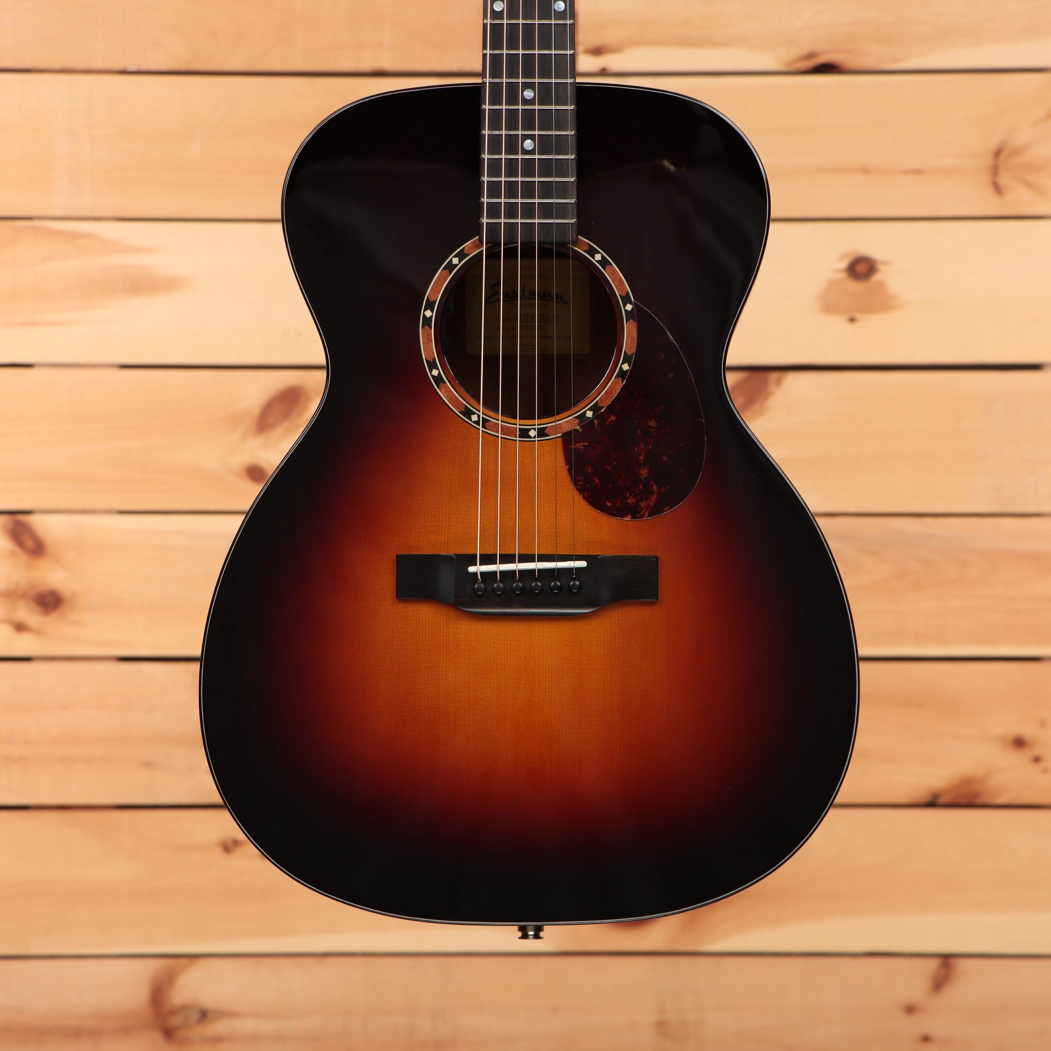 Eastman E2OM Deluxe dreadnought acoustic guitar sunburst finish with tortoiseshell pickguard