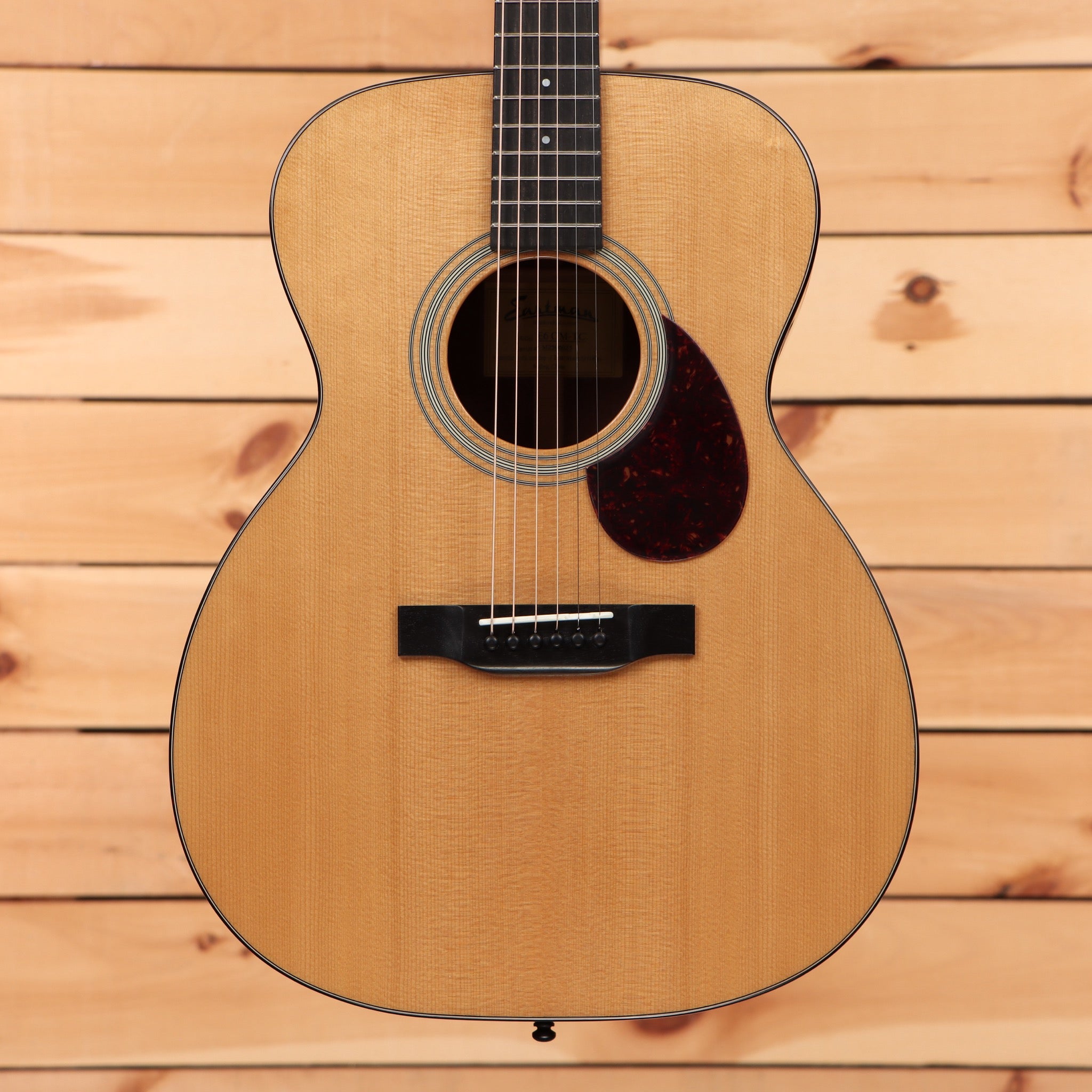 Eastman E6OMTC acoustic guitar natural finish with rosewood pickguard