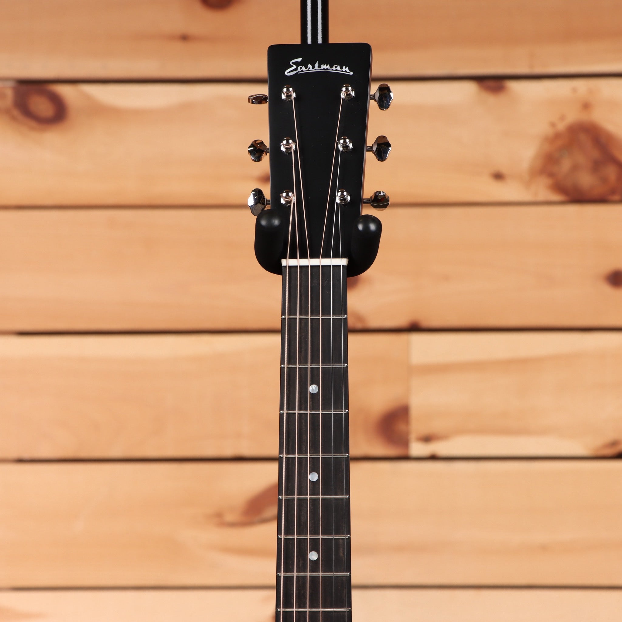 Eastman E60OMTC acoustic guitar natural finish with rosewood fretboard and chrome tuning machines