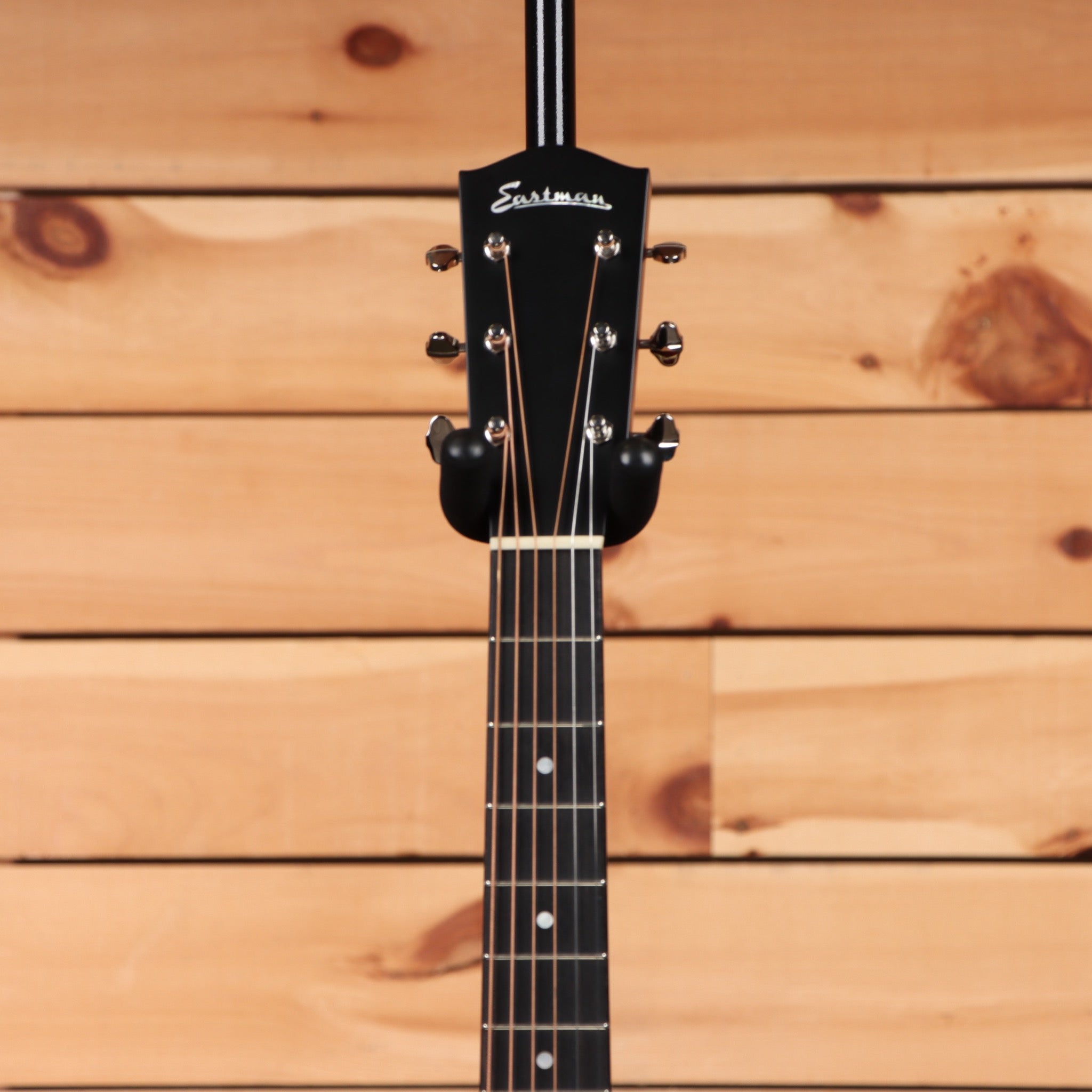 Eastman E6SSTC natural semi-hollow electric guitar with black finish and chrome tuning machines