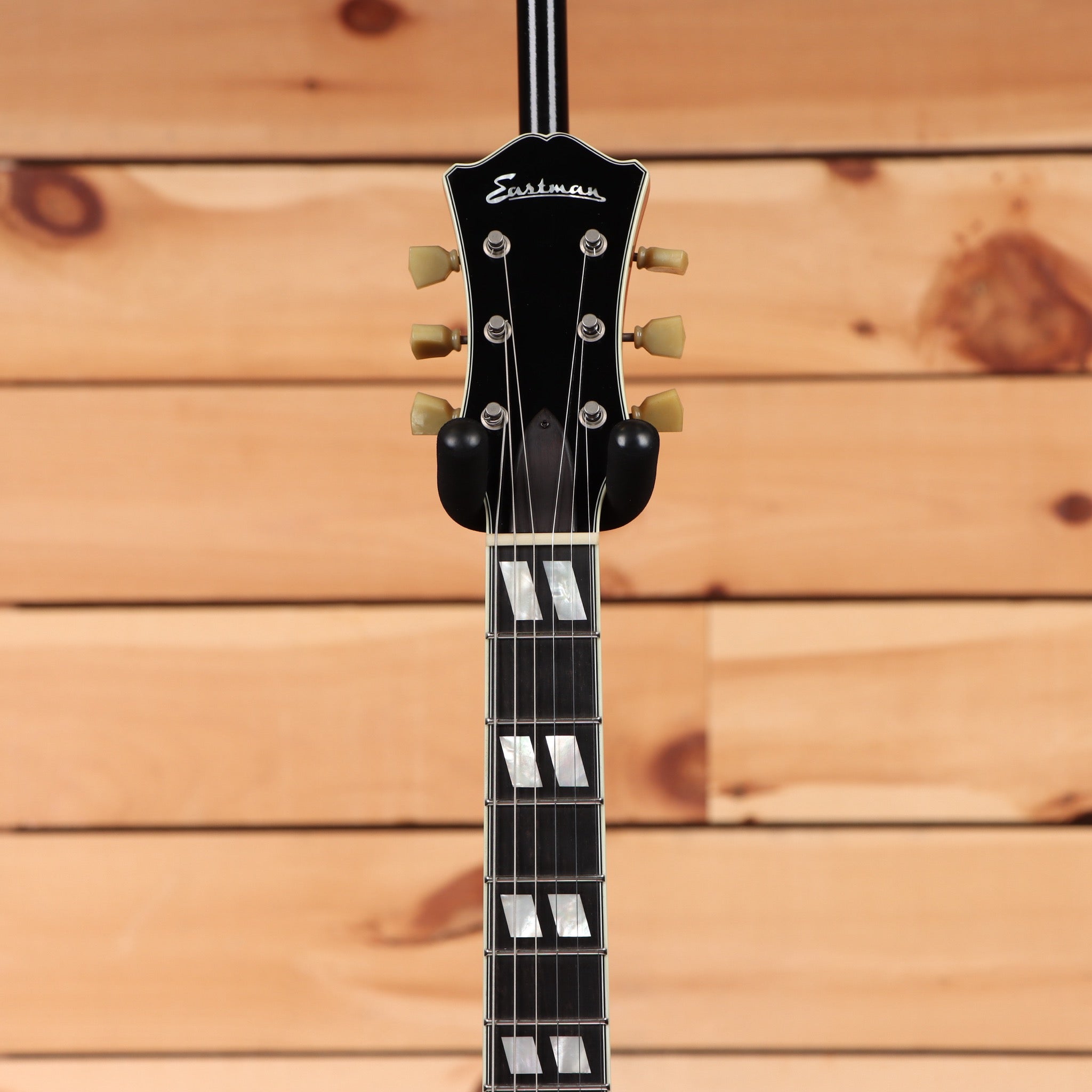 Eastman T59/TV vintage amber semi-hollowbody electric guitar with block inlays and cream tuning pegs