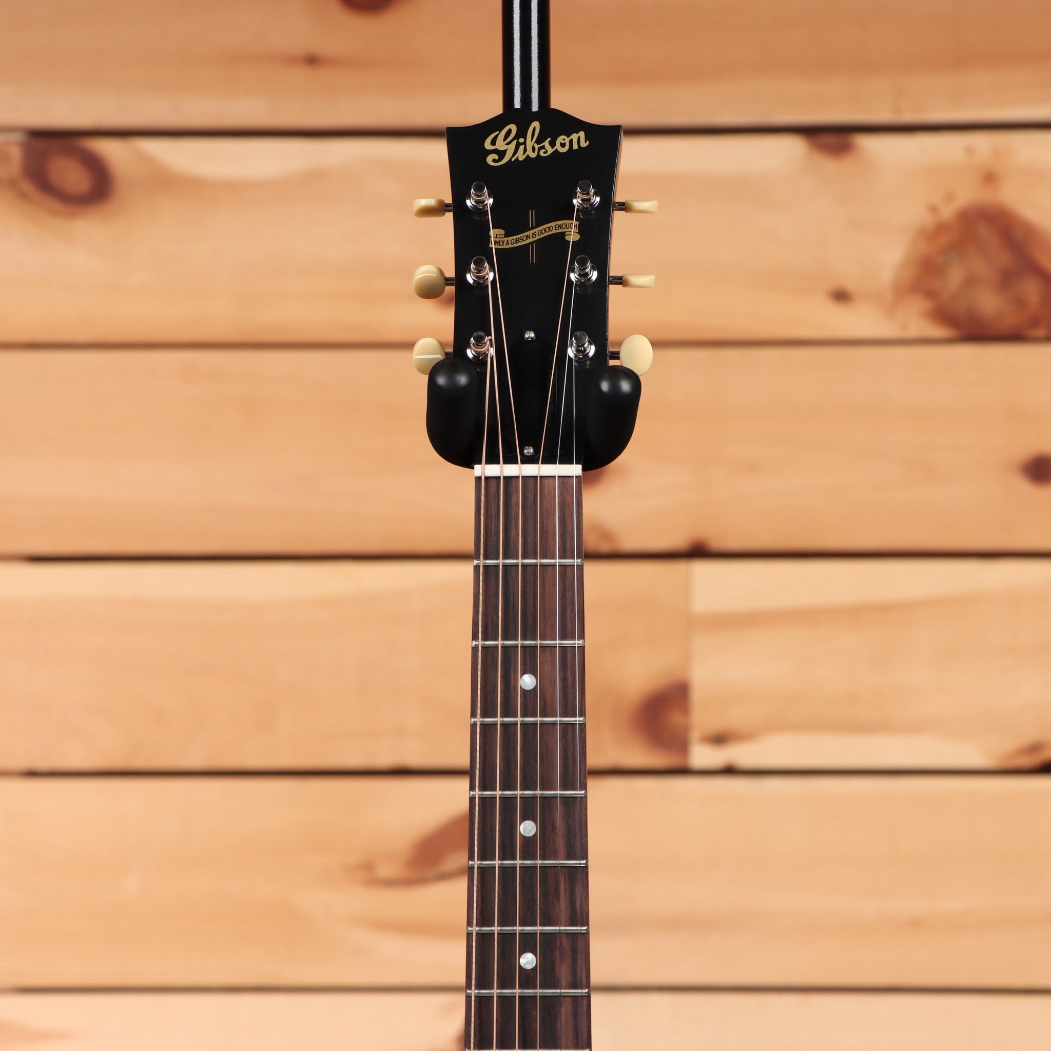 Gibson J-45 acoustic guitar vintage sunburst with rosewood fretboard and cream binding