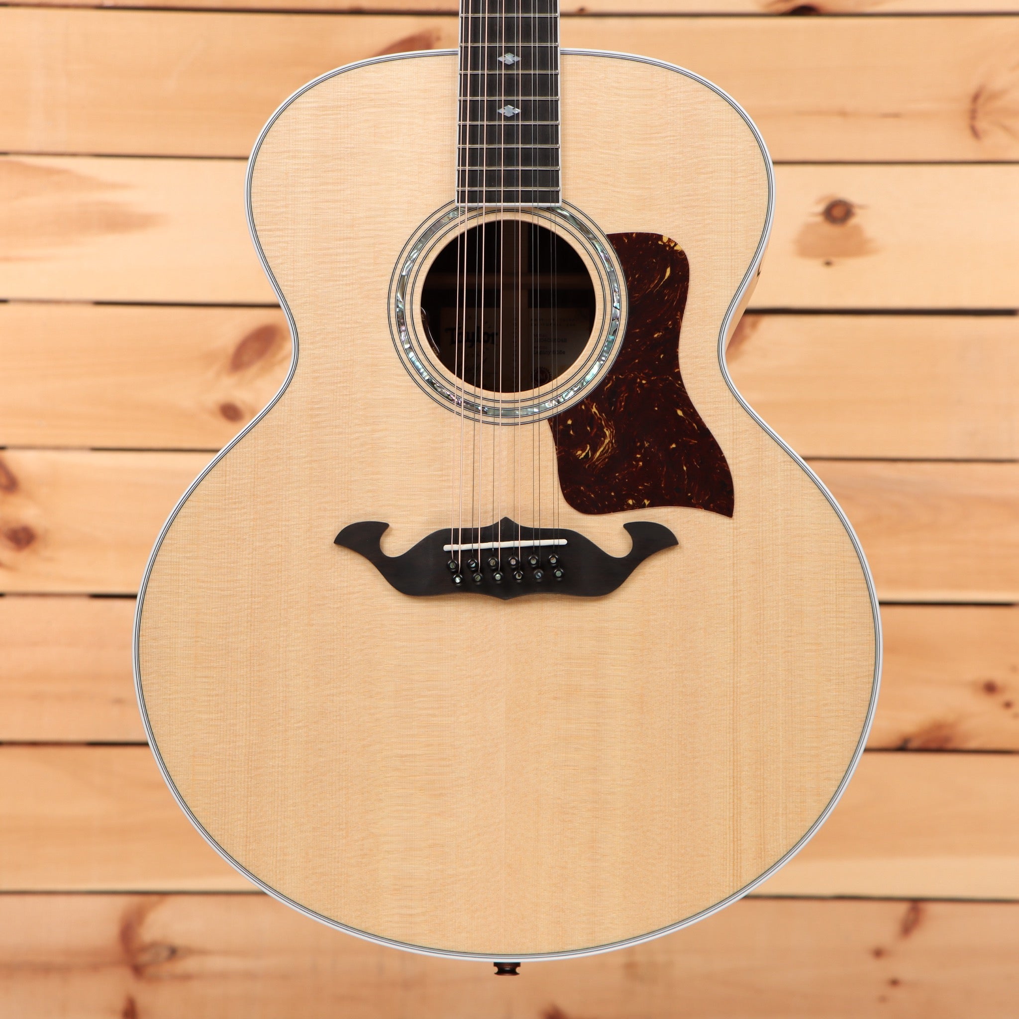 Taylor Legacy 855e acoustic-electric guitar natural finish with 12-string configuration and tortoiseshell pickguard