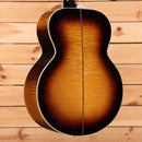 Gibson 1957 SJ200 acoustic guitar Light Aged Vintage Sunburst with cream binding and flamed maple top