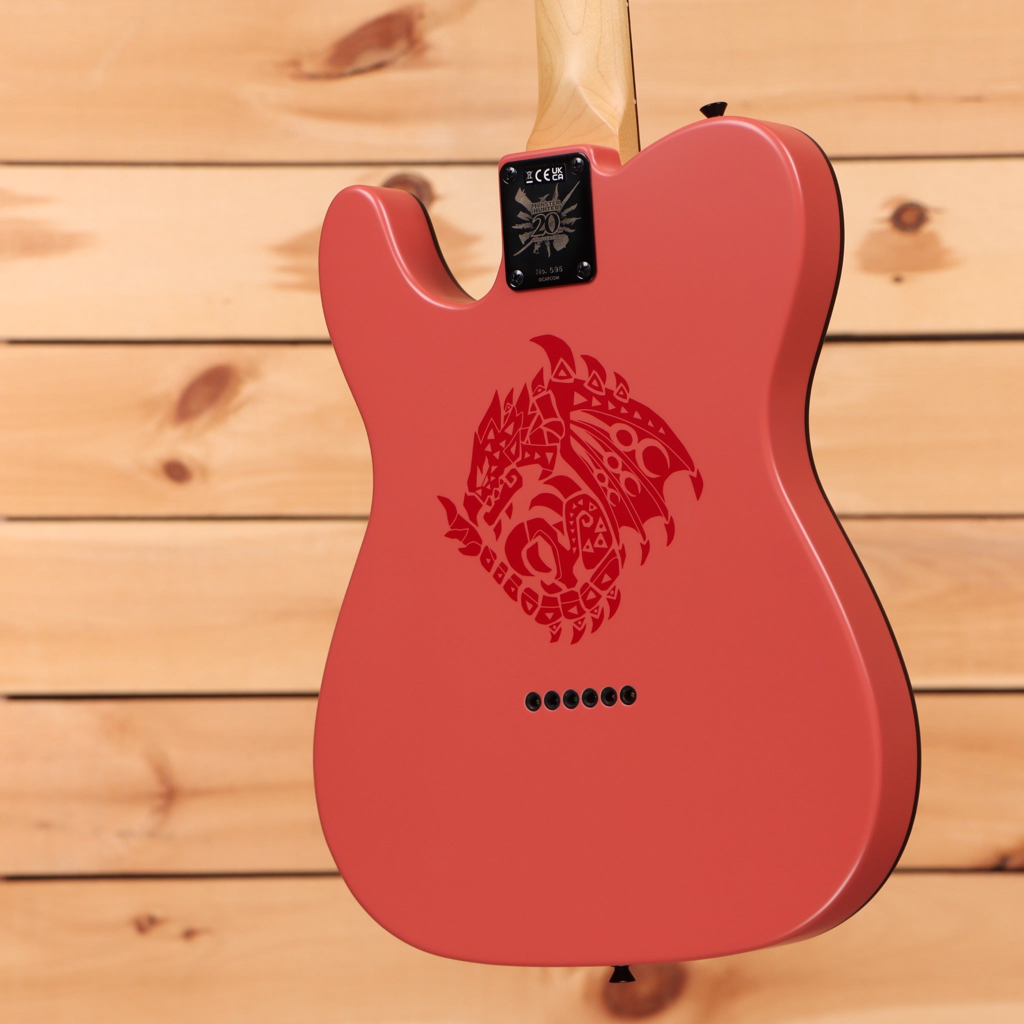 Fender Monster Hunter Rathalos Telecaster electric guitar Rathalos Red with intricate beast graphic design