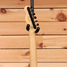 Fender Monster Hunter Rathalos Telecaster electric guitar with maple neck and black headstock hardware