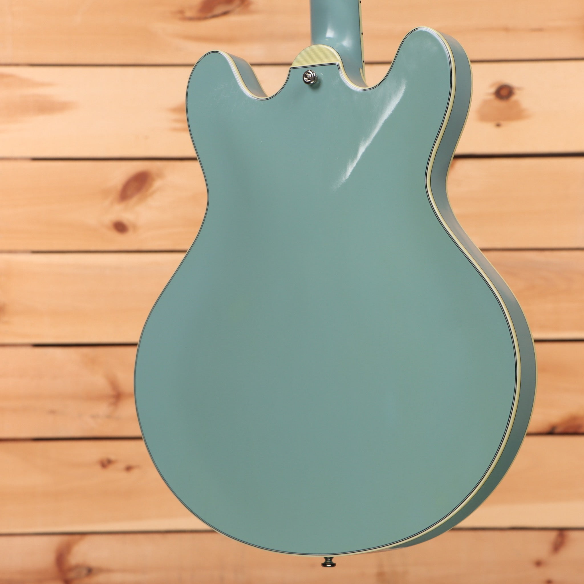 Eastman T60TV semi-hollow body electric guitar faded blue with f-holes and maple neck binding