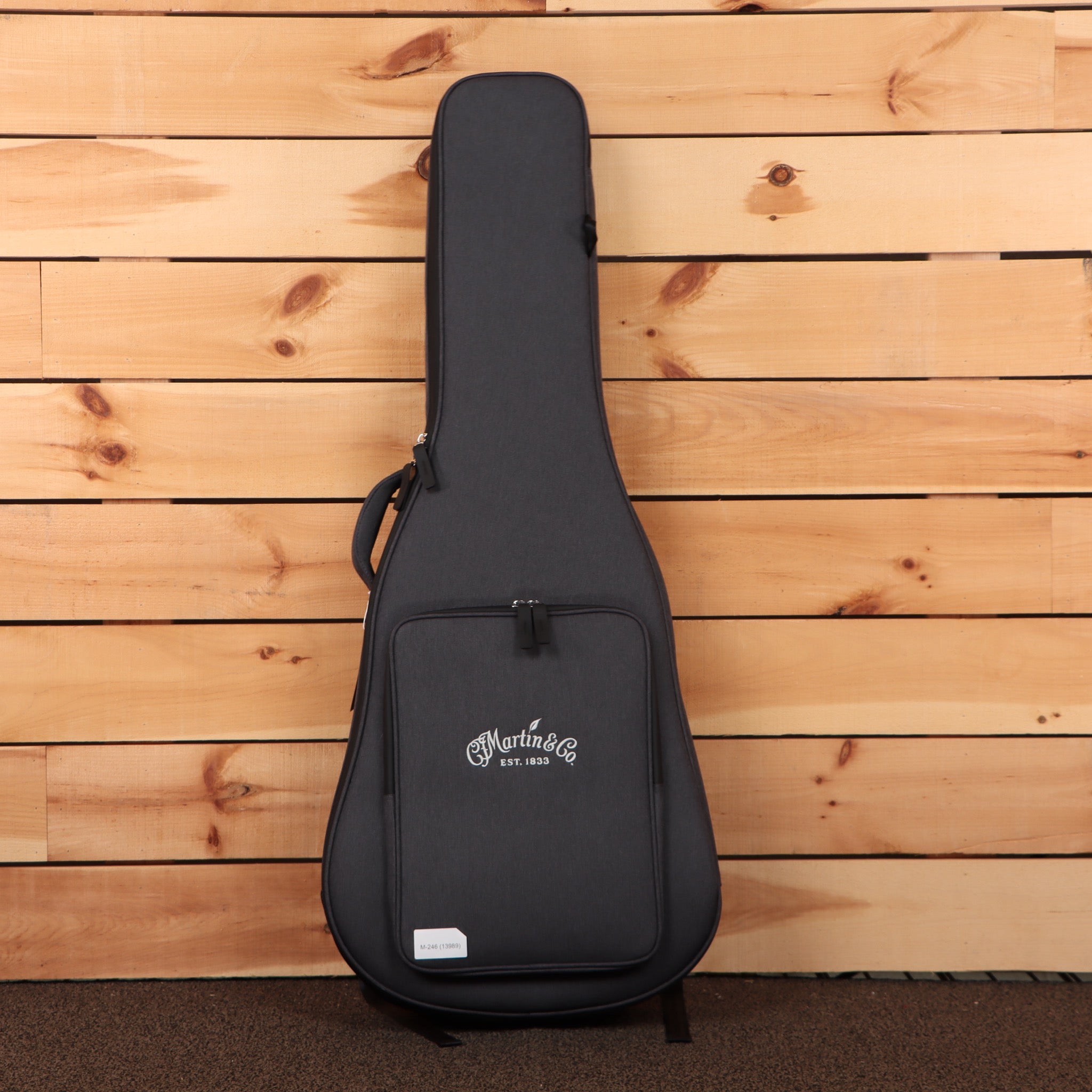 Martin DE Retro Plus Aging Toner acoustic guitar gig bag black padded with front accessory pocket and CF Martin logo