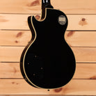 Pre-owned Gibson 1957 Les Paul Custom Reissue electric guitar Ebony VOS with gold binding and dual humbuckers
