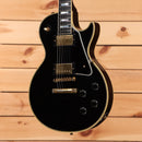 Gibson 1957 Les Paul Custom Reissue electric guitar Ebony VOS finish with gold hardware and dual humbuckers, pre-owned