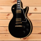 Gibson 1957 Les Paul Custom Reissue electric guitar Ebony VOS finish with gold hardware and dual humbuckers, pre-owned