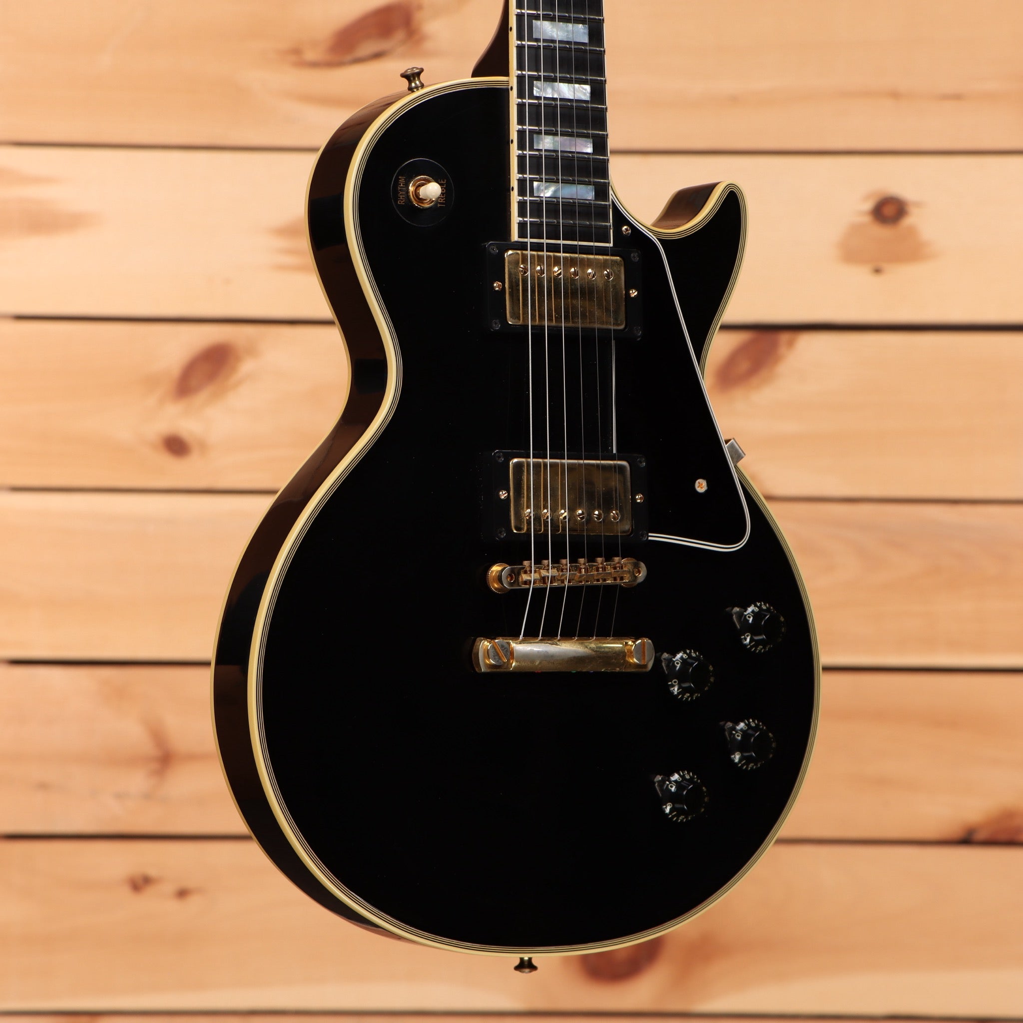 Pre-owned Gibson 1957 Les Paul Custom Reissue electric guitar Ebony VOS with gold humbuckers and binding