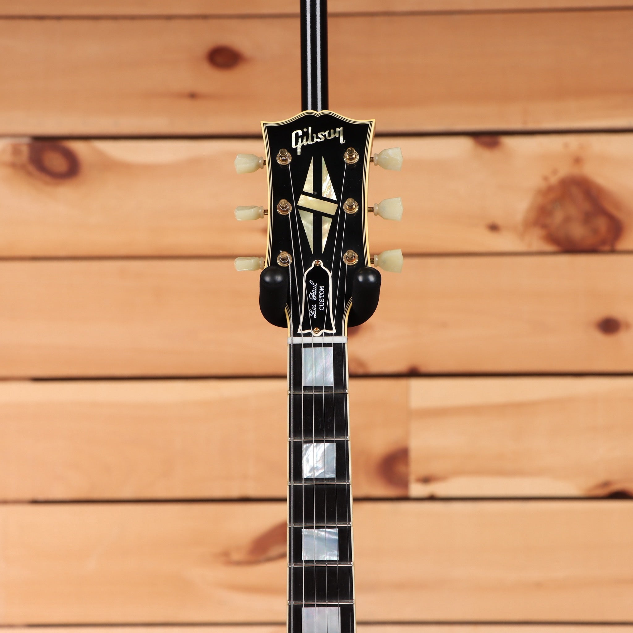 Gibson 1957 Les Paul Custom Reissue electric guitar Ebony VOS finish with dual humbuckers and gold hardware pre-owned