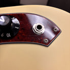 Treetone Stella electric guitar Vintage White with tortoiseshell pickguard control plate and side-mount output jack