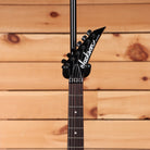 Jackson Pro Origins 1985 Sandimas SD1A electric guitar black with pointed headstock and rosewood fretboard