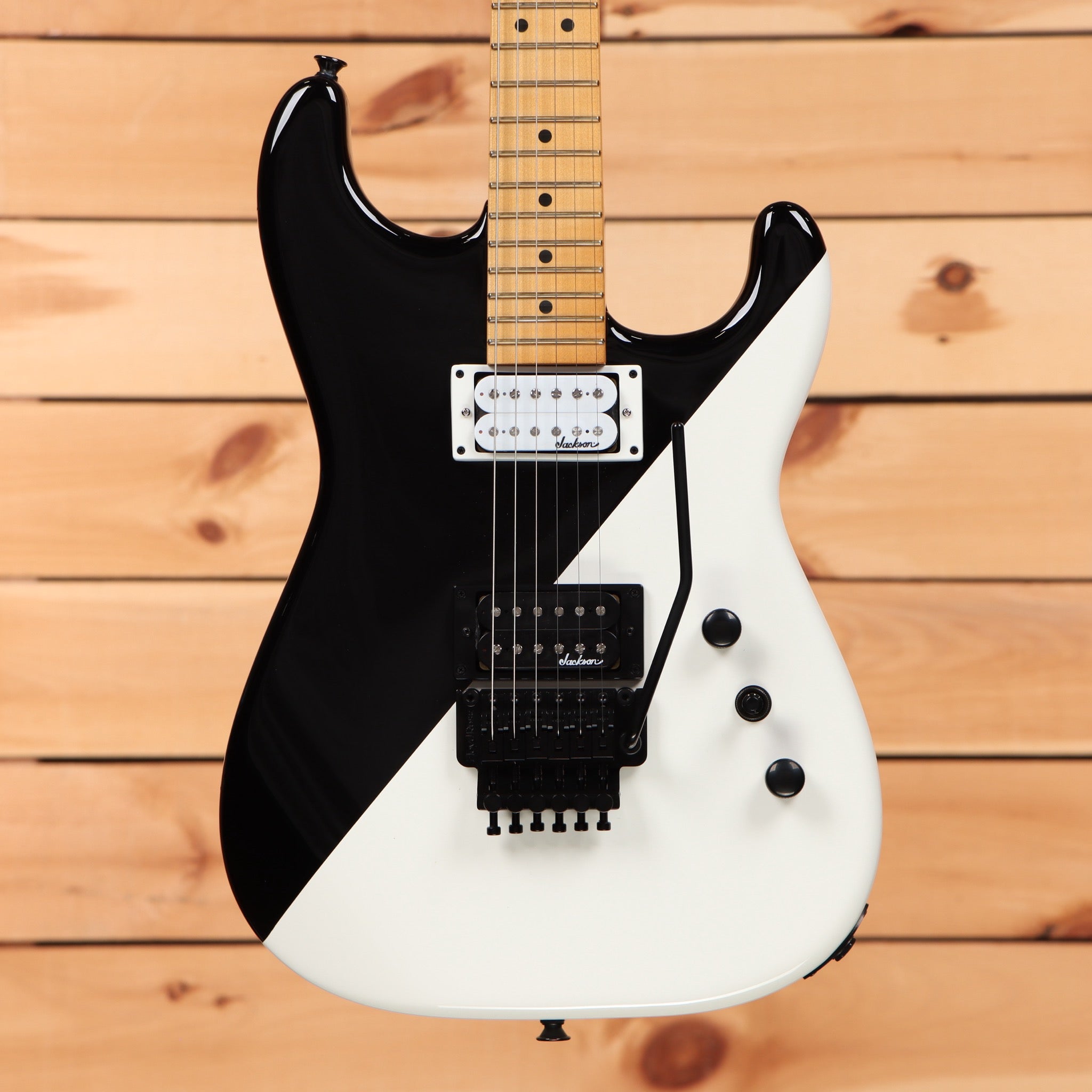 Jackson LTD Pro Origins 1985 Sandimas SD1 electric guitar two-tone black and white with humbucker pickups and Floyd Rose bridge system