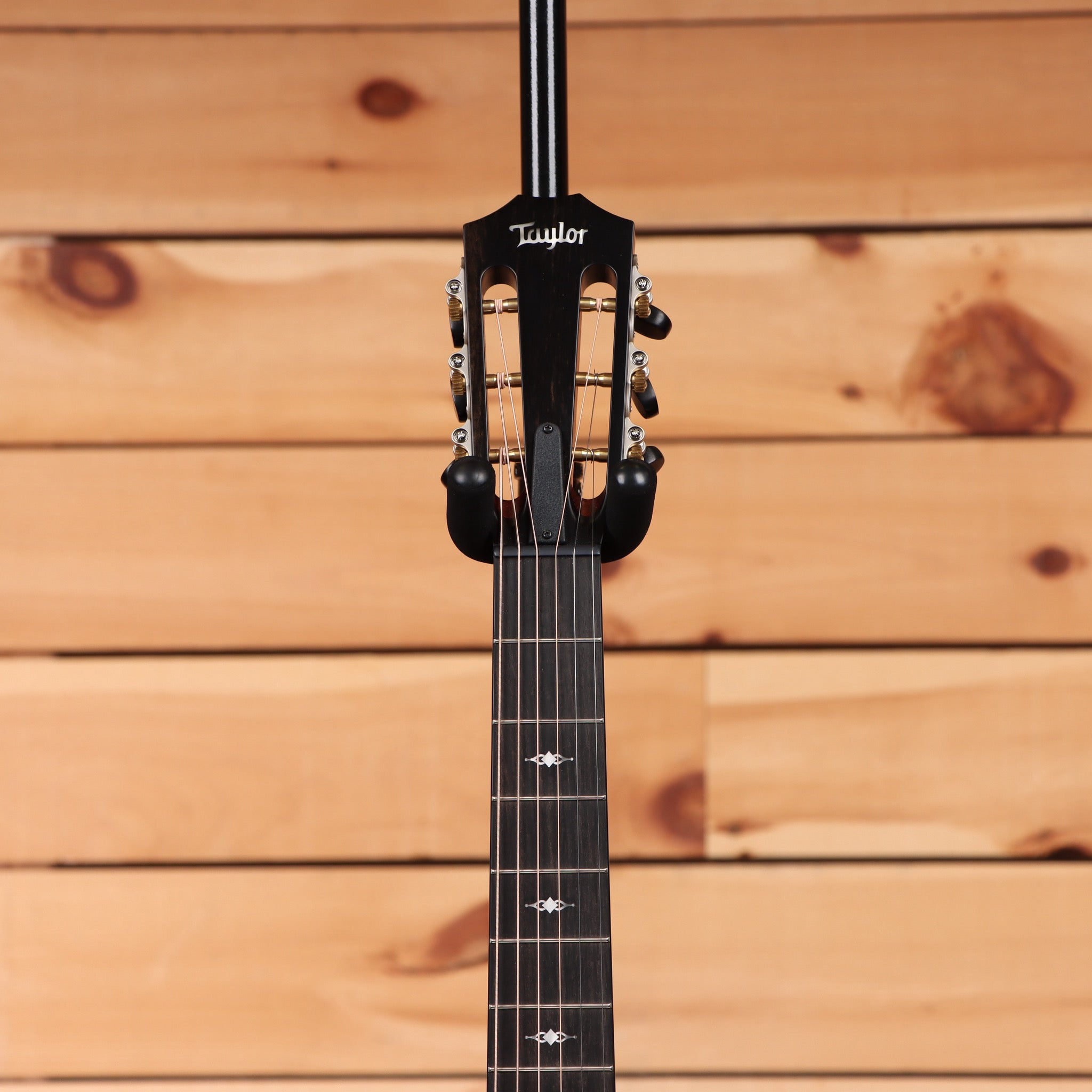 Taylor 312ce 12-fret acoustic-electric guitar natural finish with rosewood fretboard and venetian cutaway