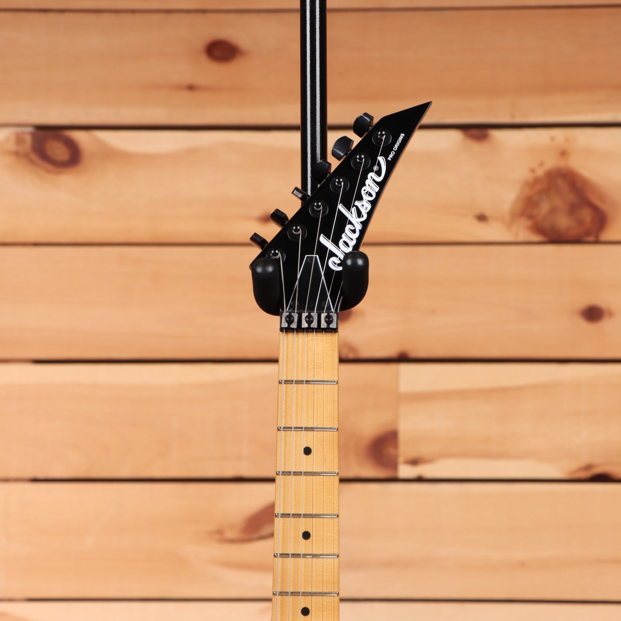 Jackson Pro Origins 1985 San Dimas SD1 electric guitar Snow White with dual humbuckers and maple neck