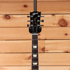 Gibson Les Paul electric guitar black headstock with chrome tuners and mother-of-pearl fret inlays