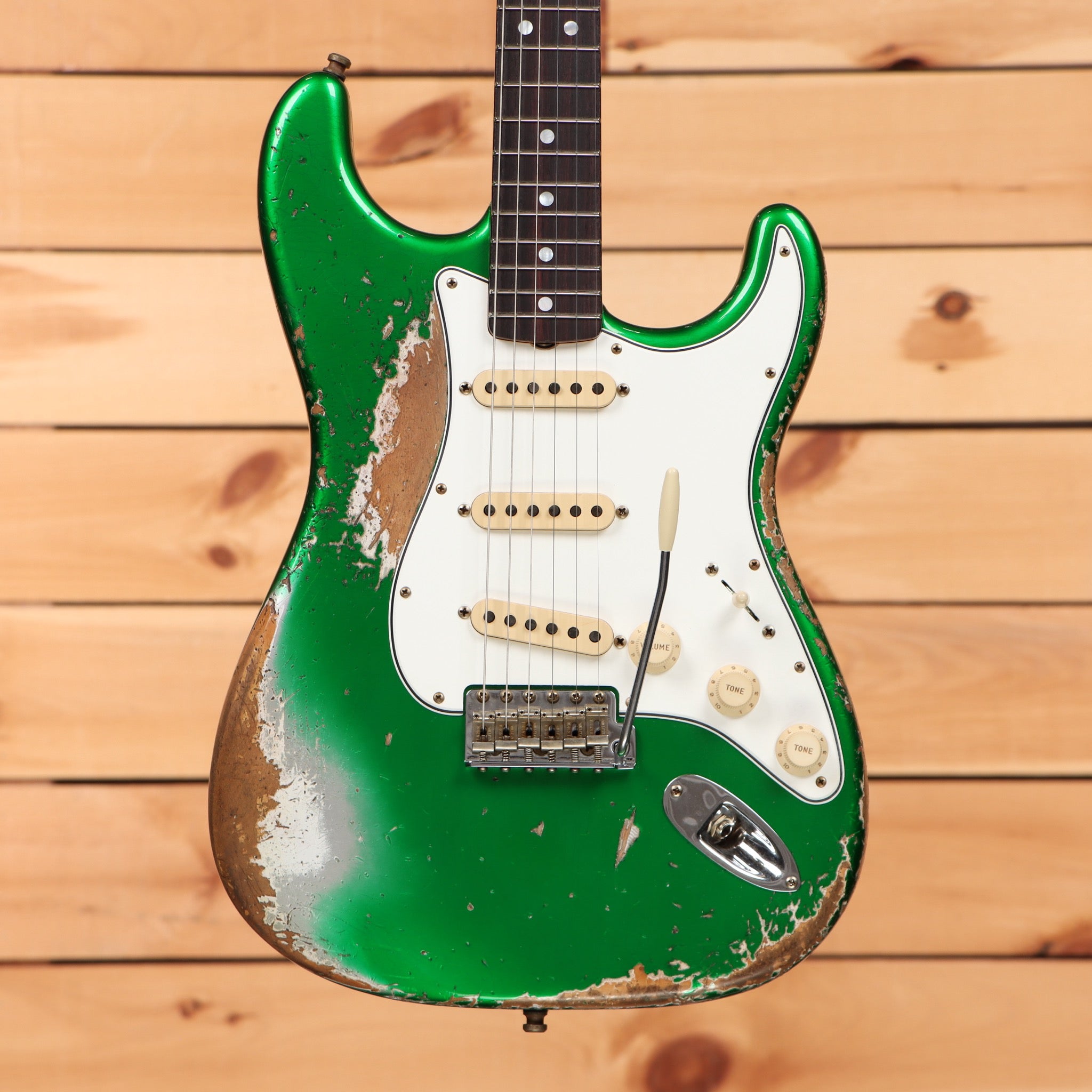 Fender Custom Shop Stratocaster Pro Super Heavy Relic electric guitar Candy Green with single-coil pickups and heavy wear