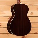 Taylor 12-Fret acoustic guitar natural finish pre-owned with cream binding and mahogany back