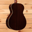 Taylor 12-Fret acoustic guitar natural finish pre-owned with cream binding and mahogany back