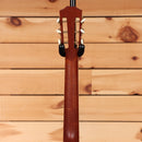 Pre-owned Taylor 12-fret classical acoustic guitar natural finish with slotted headstock