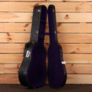 Gibson J-45 acoustic guitar vintage sunburst finish with purple velvet-lined hard case