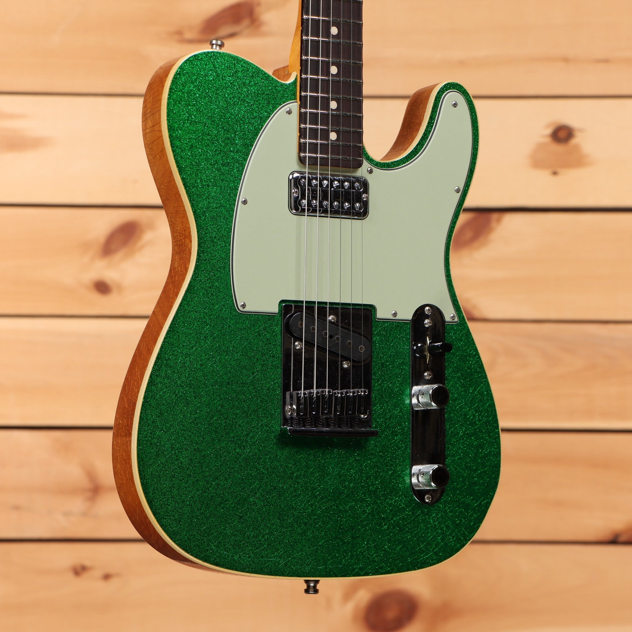 Fender Custom Shop Dual Stack HS Telecaster Deluxe electric guitar Green Sparkle with dual humbuckers and mint green pickguard