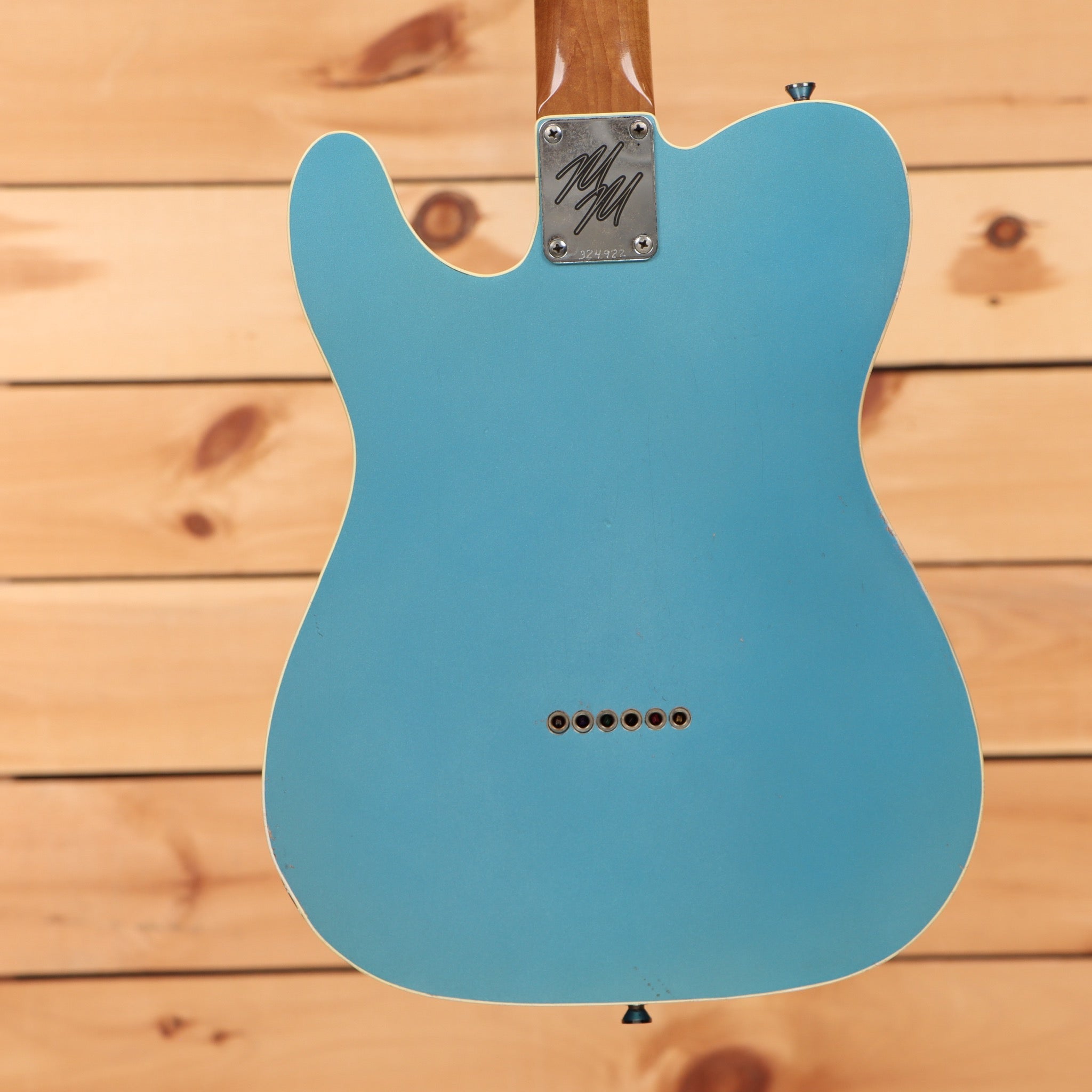 Mario Martin Model T lake Placid Blue pre-owned electric guitar with single-coil pickups