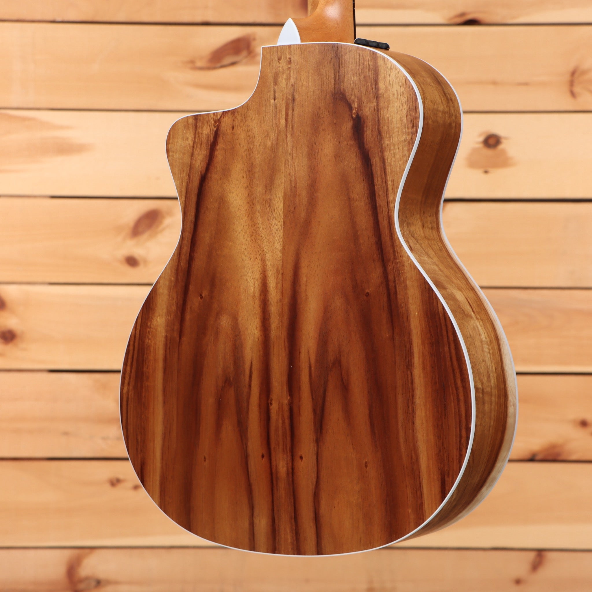 Taylor 214ce acoustic guitar natural finish with white binding and cutaway body