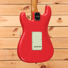 Pre-owned Fender '64 Road Worn Stratocaster electric guitar Aged Fiesta Red with single-coil pickups