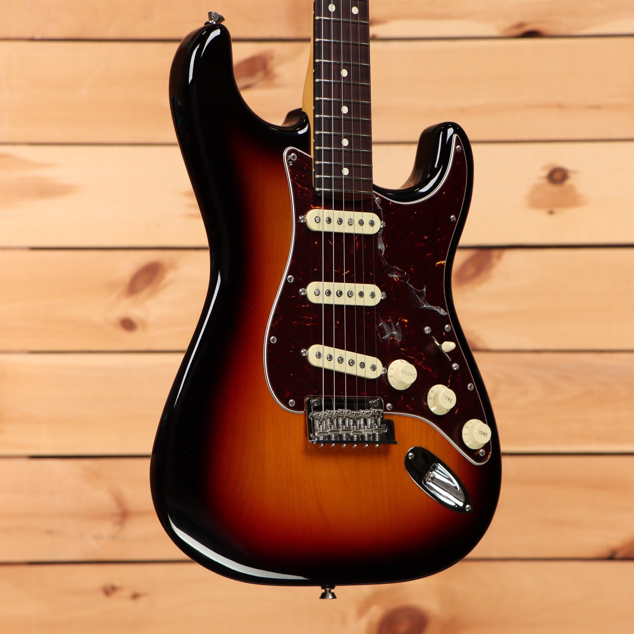 Fender American Pro II Stratocaster electric guitar 3-color sunburst pre-owned with single-coil pickups and tortoiseshell pickguard