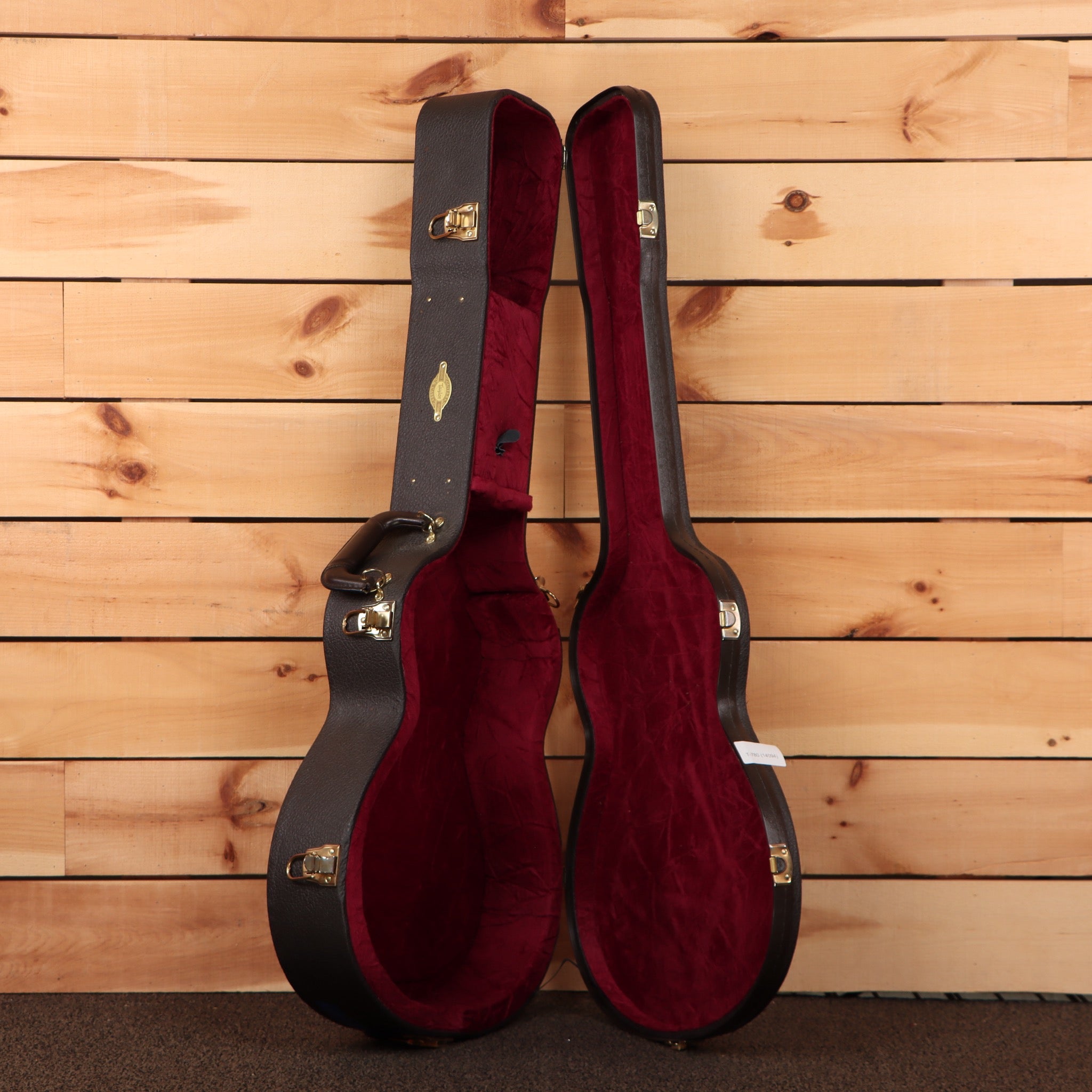 Pre-owned Taylor 12-Fret acoustic guitar natural finish with burgundy velvet-lined hard case